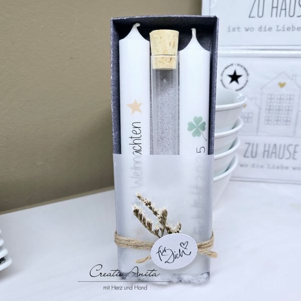 Wunscherfüller mit Kerzen als Geschenk verpackt